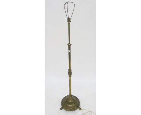 A heavy brass adjustable standard lamp Condition Report:Available upon request