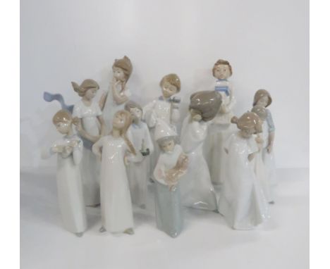 A collection of twelve Lladro and Nao children figures Condition Report:Three broken