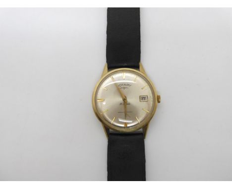 A 9ct gold gents rotary watch, hallmarked with Glasgow import marks for 1962, weight including strap and mechanism 29.5gms Co