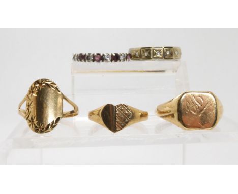 Two 9ct gold signet rings, another ring, weight for all 5.6gms, and two gem set rings Condition Report:Available upon request