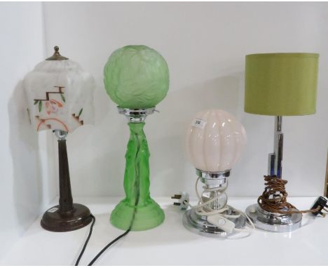 An Art Deco green glass table lamp, and three other lamps Condition Report:Available upon request