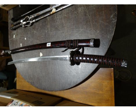     A Decorative Samurai Sword In Scabbard                                          