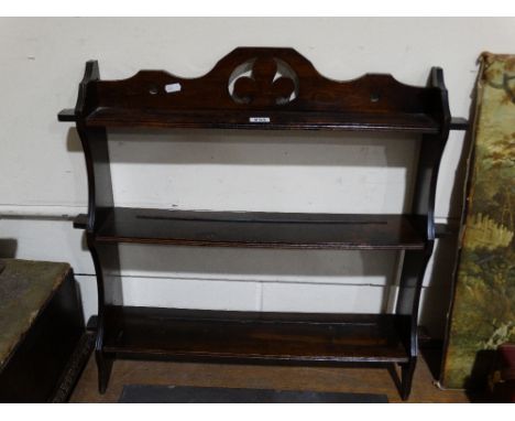     An Edwardian Mahogany Three Shelf Wall Rack                                     