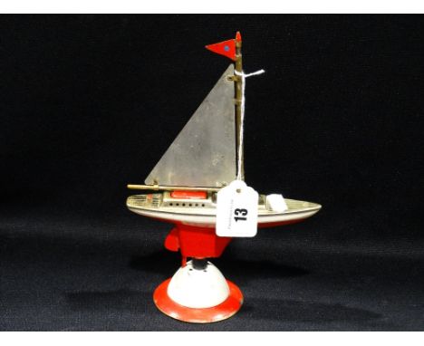     A Vintage Table Lighter In The Shape Of A Yacht                                 