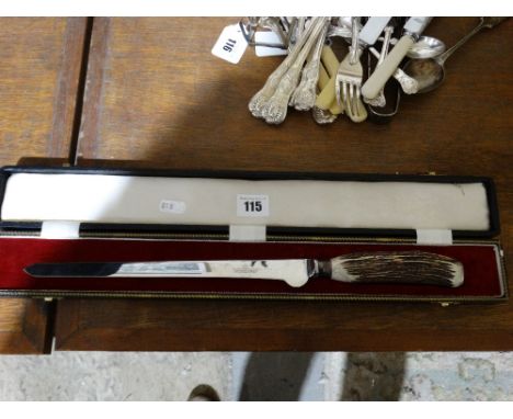     A Cased Vintage Carving Knife                                                   