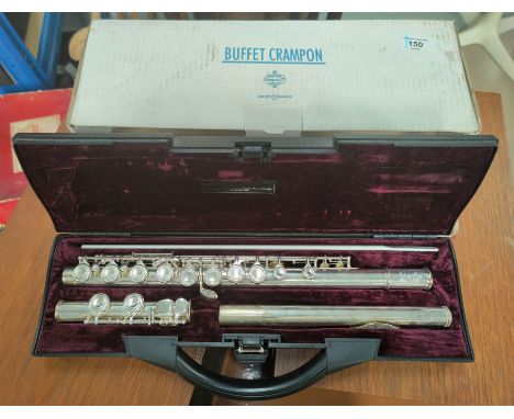Flute:  A Buffet Crampon Paris, Boosey and Hawkes hard cased flute. 