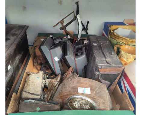 A 1930's mantel clock, a selection of camera and other equipment, two Polaroid cameras 