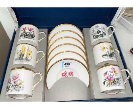 A Royal Worcester boxed set of 6 coffee cups and saucers with polychrome botanical decoration 