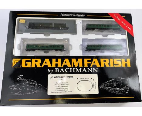 A Graham Farish N gauge originally boxed Atlantic Coast Set with 4-6-2 Loco and 4 Coaches - comprising Merchant Navy Loco, 2 