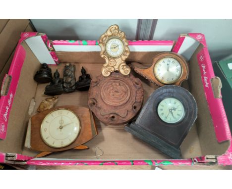 An 8 day mantel clock, an Art Deco mantel clock, a modern Chinese soapstone seal in the form of a Buddha, other modern Buddha