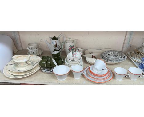 An Art Deco part tea set with orange borders, 13 pieces approx; an 18 piece Stylecraft part coffee set by Midwinter; a "River