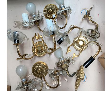 A chandelier light fitting with cut faceted drops; other lights 