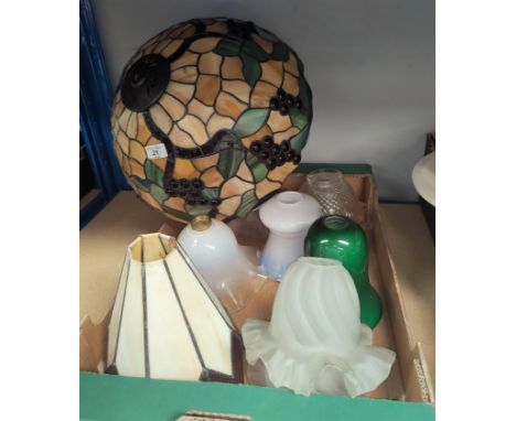 A Tiffany style coloured and beaded glass light shade and other glass lightshades 