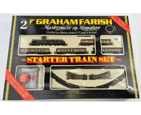A Graham Farish N Gauge originally boxed Queen Elizabeth Golden Jubilee Set Size 2, with Loco, tender, 4 coaches and track 