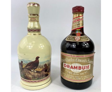 A Wade ceramic bottle containing 70 cl of Famous Grouse Scotch whisky; a 1 litre bottle of Drambuie 