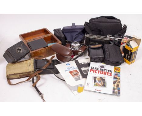 A SELECTION OF VINTAGE CAMERAS to include Kodak box brownies, cased accessories, Kodak Pronto film camera in case etc., (a qu
