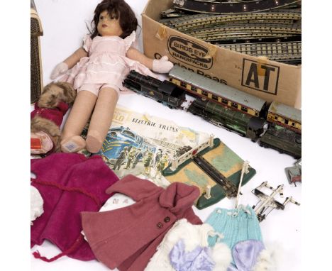A CHAD VALLEY CLOTH DOLL with pressed felt face together with a Reuge musical doll, a small quantity of Hornby Dublo train se