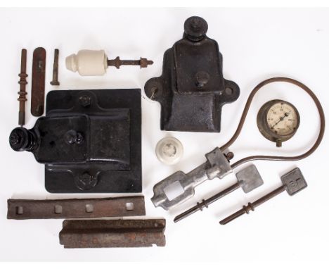 A GROUP OF GWR RELATED ITEMS to include two axle box covers, a mail catching hoop, ceramic electrical toppers etc.