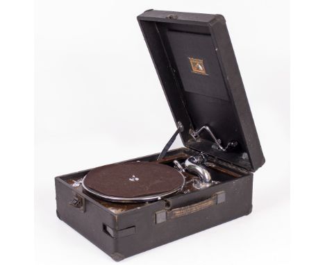AN OLD GRAMOPHONE RECORD PLAYER together with a child's toy sewing machine, a carriage clock, commemorative mugs, an old fish