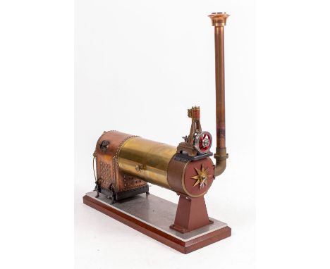 A PART FINISHED SCALE MODEL OF A SAVAGE KING'S LYNN FAIRGROUND CAROUSEL CENTRE ENGINE with organ engine mounted to the front 