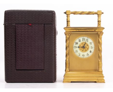 A 19TH CENTURY BRASS CASED CARRIAGE CLOCK with circular enamel dial with Arabic numerals, on stepped plinth base, in fitted c