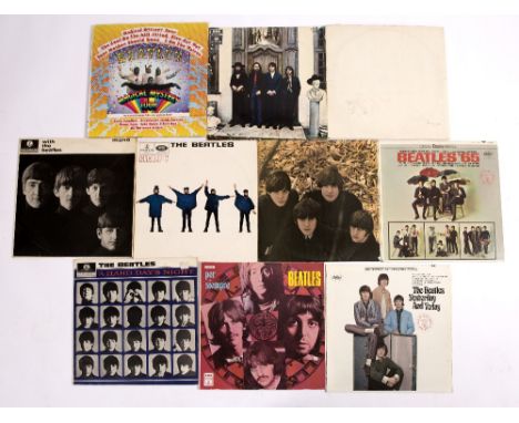 TEN THE BEATLES VINYL RECORDS to include White Album, numbered 0521446 to include fold out double sided poster and one colour