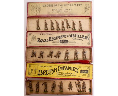 A SET OF BRITAINS BOXED TEAM OF GUNNERS carrying shells No. 1730 complete with tatty but original box together with a set of 