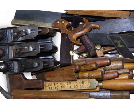 A COLLECTION OF CARPENTERS TOOLS to include chisels, three Bailey smoothing planes, two No. 4's and one grooved No. 3, furthe