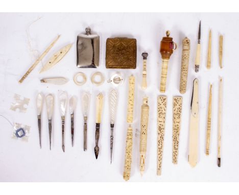 A COLLECTION OF ANTIQUE IVORY AND BONE MOUNTED NEEDLEWORK TOOLS to include needle cases etc., together with mother of pearl h
