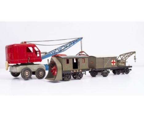 A HORNBY 'O' GAUGE LNER SNOW PLOUGH 18cm long together with a Hornby 'O' gauge LMS crane mounted wagon, 24cm long and a Gama 