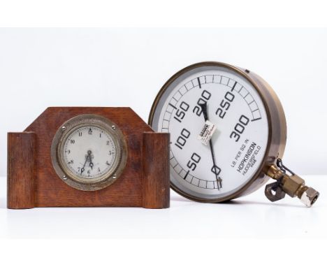 A PRESSURE GAUGE by Hopkinson of Huddersfield measuring up to 330lbs per square inch, the dial 8" diameter or 20.3cm together