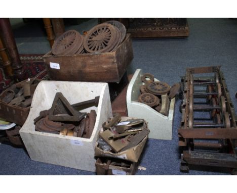A COLLECTION OF SCALE MODEL LOCOMOTIVE IRON AND BRASS CASTINGS and parts to include a pair of locomotive cylinders, a large c