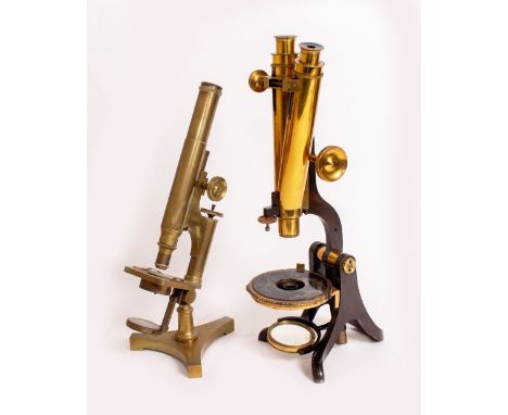 A LACQUERED BRASS BINOCULAR MICROSCOPE by Henry Crouch of London No. 2956 in a fitted mahogany case with various lenses and a