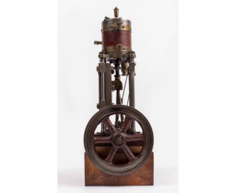 A 19TH CENTURY SINGLE CYLINDER VERTICAL STEAM ENGINE with vertical slide and fly wheel, oiler mounted to the top and with rot