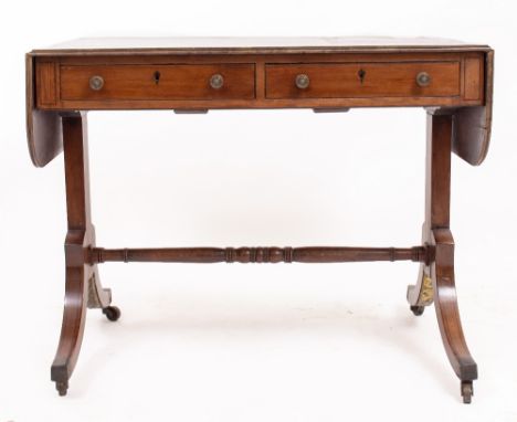 A REGENCY MAHOGANY DROP FLAP SOFA TABLE with two frieze drawers and sabre end supports, 90cm wide x 65cm deep x 74cm high