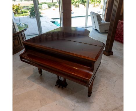 Wm. Knabe &amp; Co. grand piano featuring a polished wood case with a hinged lid and three-pedal mechanism. The piano bears t