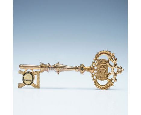 This distinguished gold-toned Miami-Dade County Key to the City is a symbol of honor and recognition, traditionally awarded t