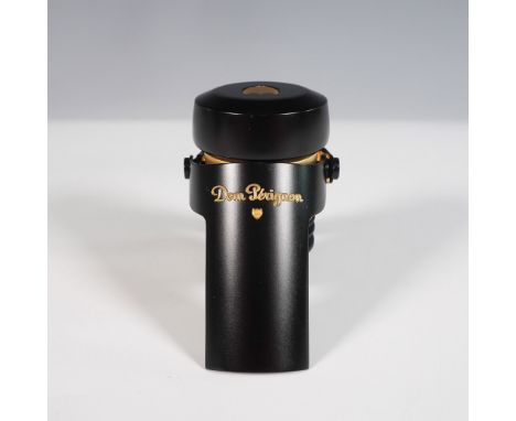 Luxury Dom Perignon champagne bottle stopper in an elegant black and gold finish. Designed to preserve the freshness and effe