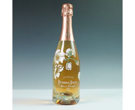 A bottle of Perrier-Jouet Belle epoque Rose 2013 vintage Champagne, presented in its original decorative box. This esteemed c