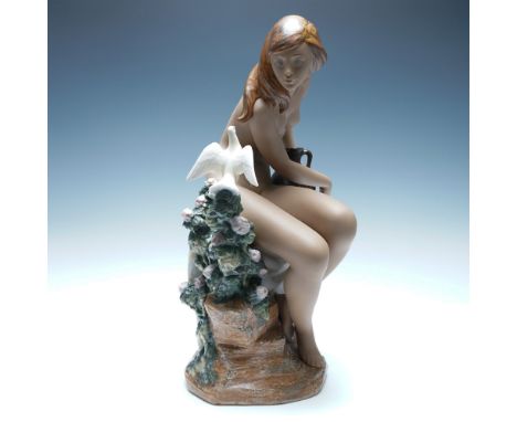 A stunning Lladro porcelain figurine titled Nude with Dove (Desnudo con Paloma), model number 3503. Designed by sculptor Juan