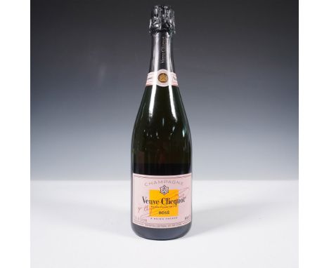An exceptional bottle of Veuve Clicquot Rose Champagne, renowned for its bold character and refined craftsmanship. Produced i