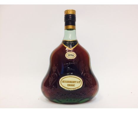 HENNESSY EXTRA 
Cognac, France.
24 fl.oz, 70° proof.
 CONDITION REPORT: Fill level high shoulder.