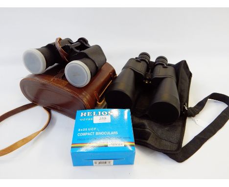Three pairs of binoculars to include modern rubber-coated pair 10-30x60 zoom (cased), Pentax Asahi 7x50 field glasses (in lea