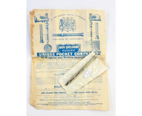 A John Sheldon's patent unique pocket companion/weighing and writing apparatus, engine-turned, white metal with advertising p