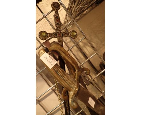 Three brass handled Indian army sabres and a decorative sword