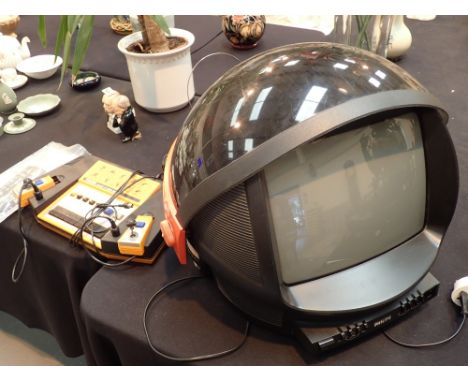 Philips Space Helmet TV and Binatone games machine CONDITION REPORT: This item has been PAT tested. Please note that this sim