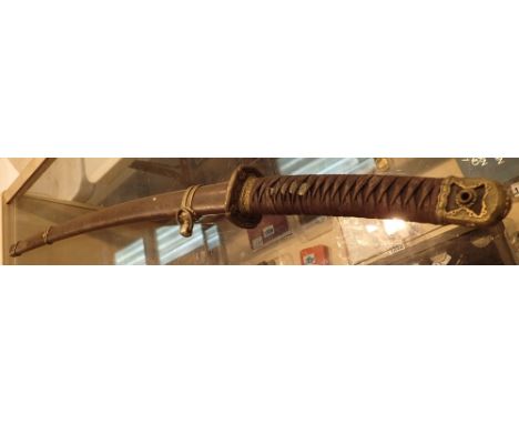 Japanese Wakizashi with chrysanthemum flower detail to the tsuba and pommel cord wrapped shagreen grip approximate blade L: 6