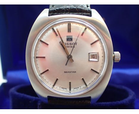 Gents Tissot automatic Seastar stainless steel in original box  CONDITION REPORT: This item appears to be in working order. D