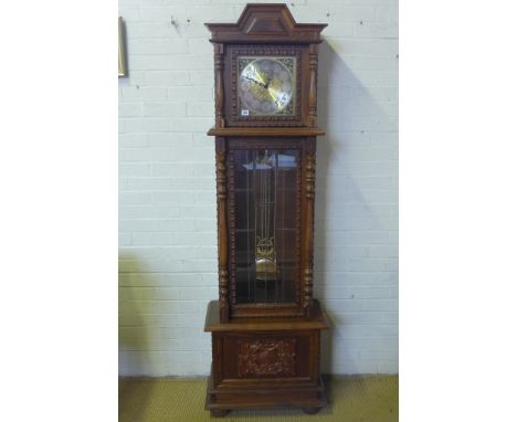 A reproduction oak effect longcase clock with a three train movement the dial signed Mensinger - Height 199cm 
Condition repo