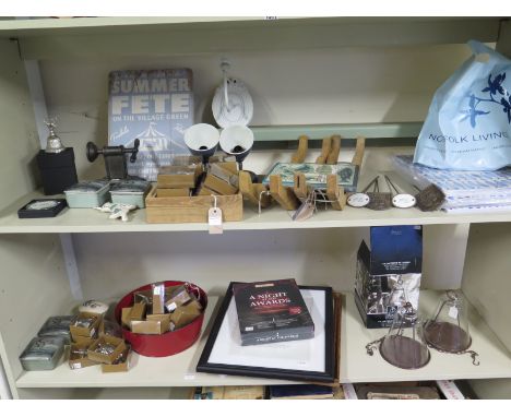 An interesting assortment of items to include two wooden wine racks, garden lanterns, light fittings etc. from Norfolk Living